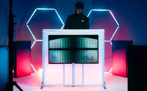 Frameworks’ Latest DJ Facade Transforms into a Screen-Driven Booth Element